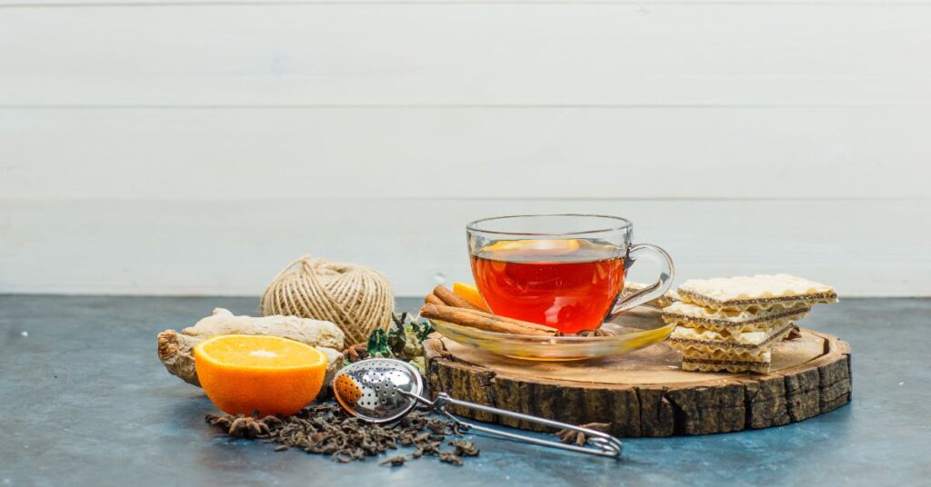 A cozy tea setup or a cup of steaming herbal tea.